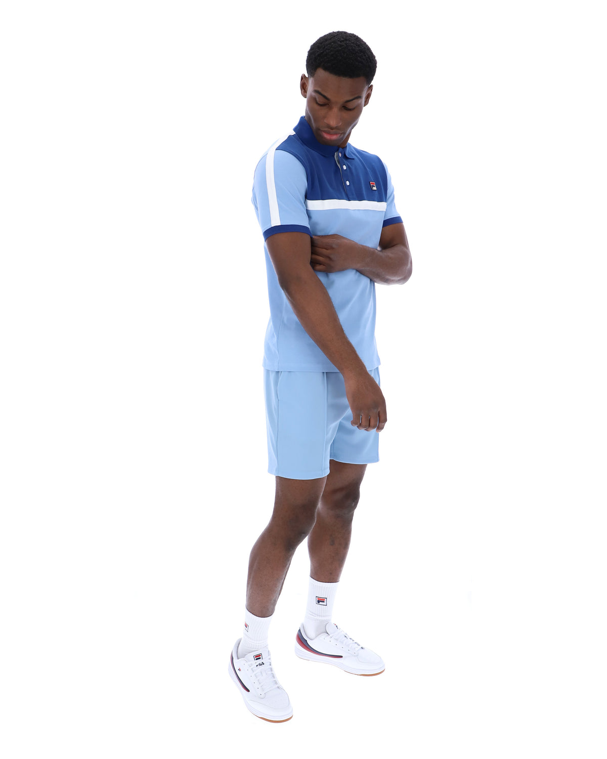 Displays a model wearing the Frozen Fjord 'FILA' branded Mattia Contrast Panel Polo Shirt