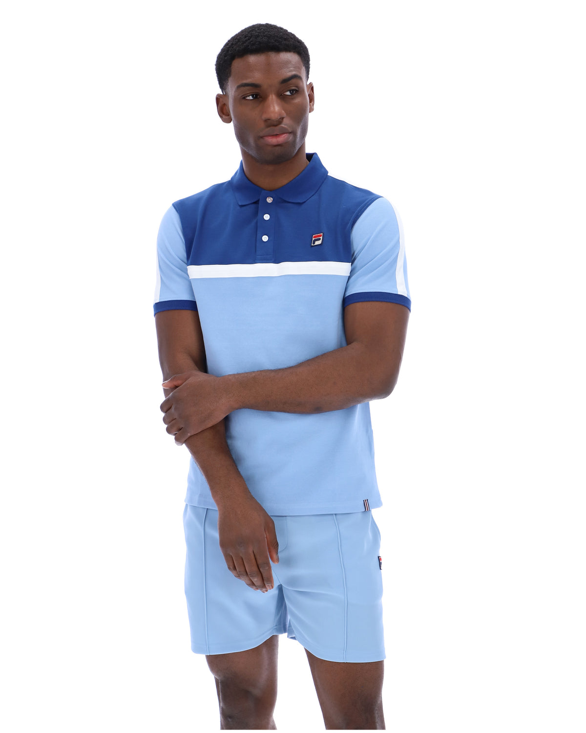 Displays a model wearing the Frozen Fjord 'FILA' branded Mattia Contrast Panel Polo Shirt