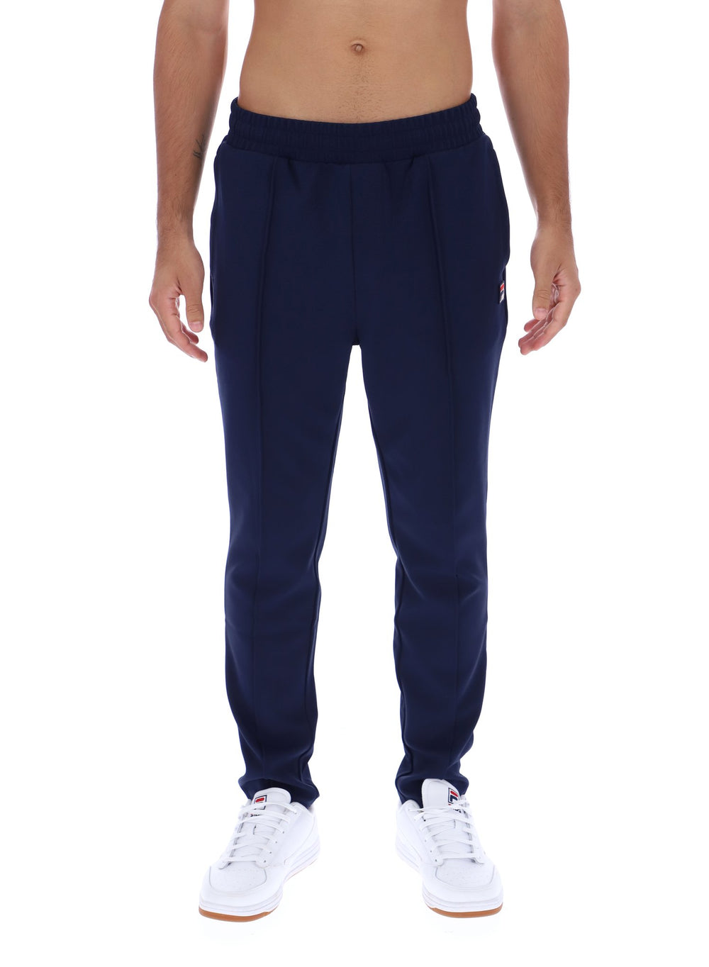 Navy blue sweatpants worn by a person on a white background