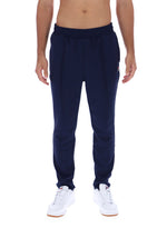 Navy blue sweatpants worn by a person on a white background