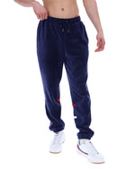 Navy blue sweatpants worn by a person on a white background