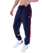 Navy tracksuit with red stripes worn by a person on a white background