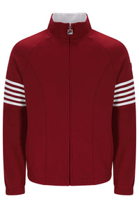 A red zip-up track jacket with a stand collar, featuring four white stripes on each sleeve and a small Fila logo on the zipper pull.