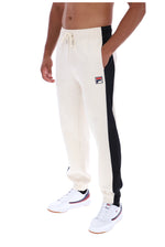 Displays a model wearing the Gardenia/ Black 'FILA' branded Patrico Colour Blocked Pant
