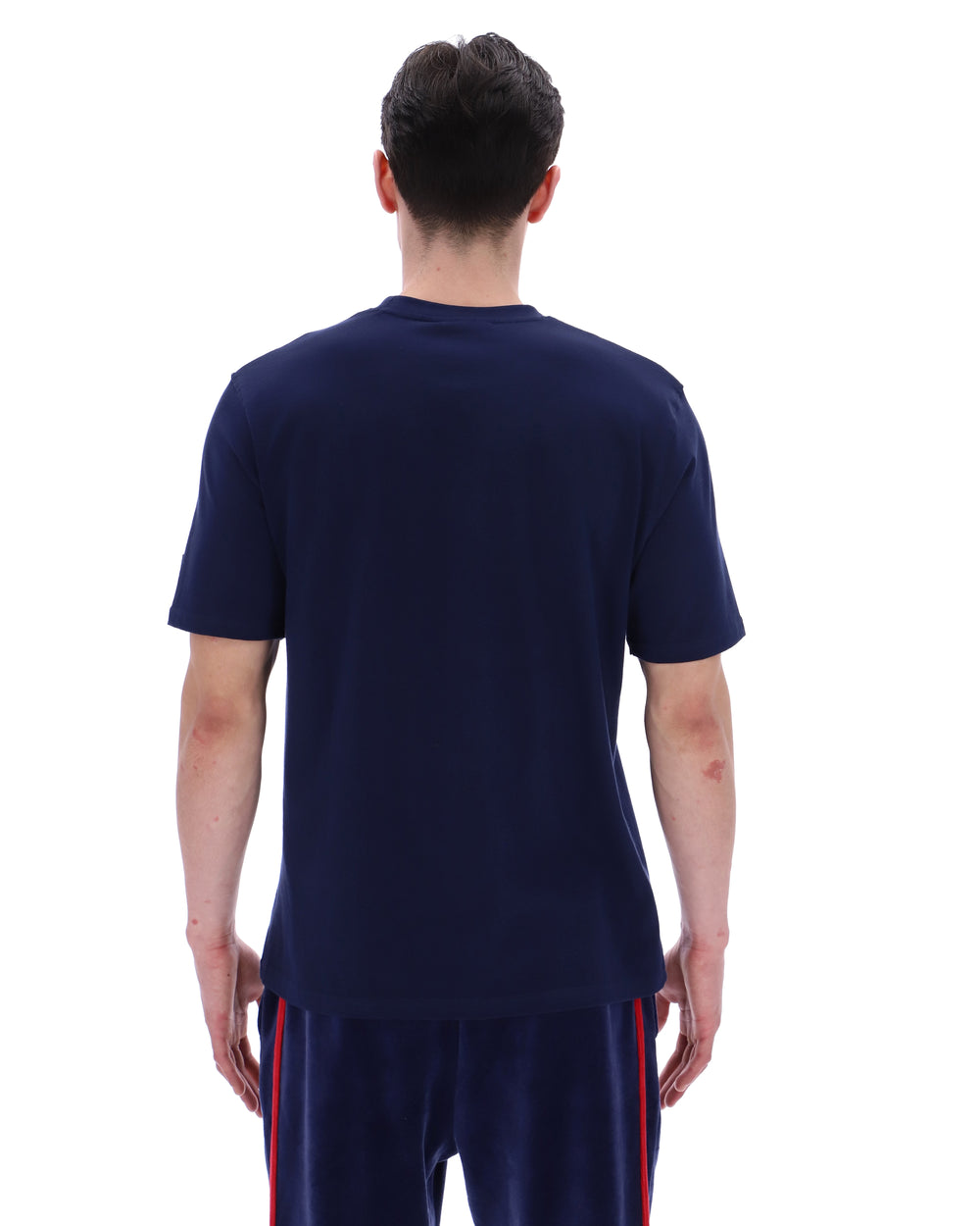 Man wearing a navy blue t-shirt on a white background