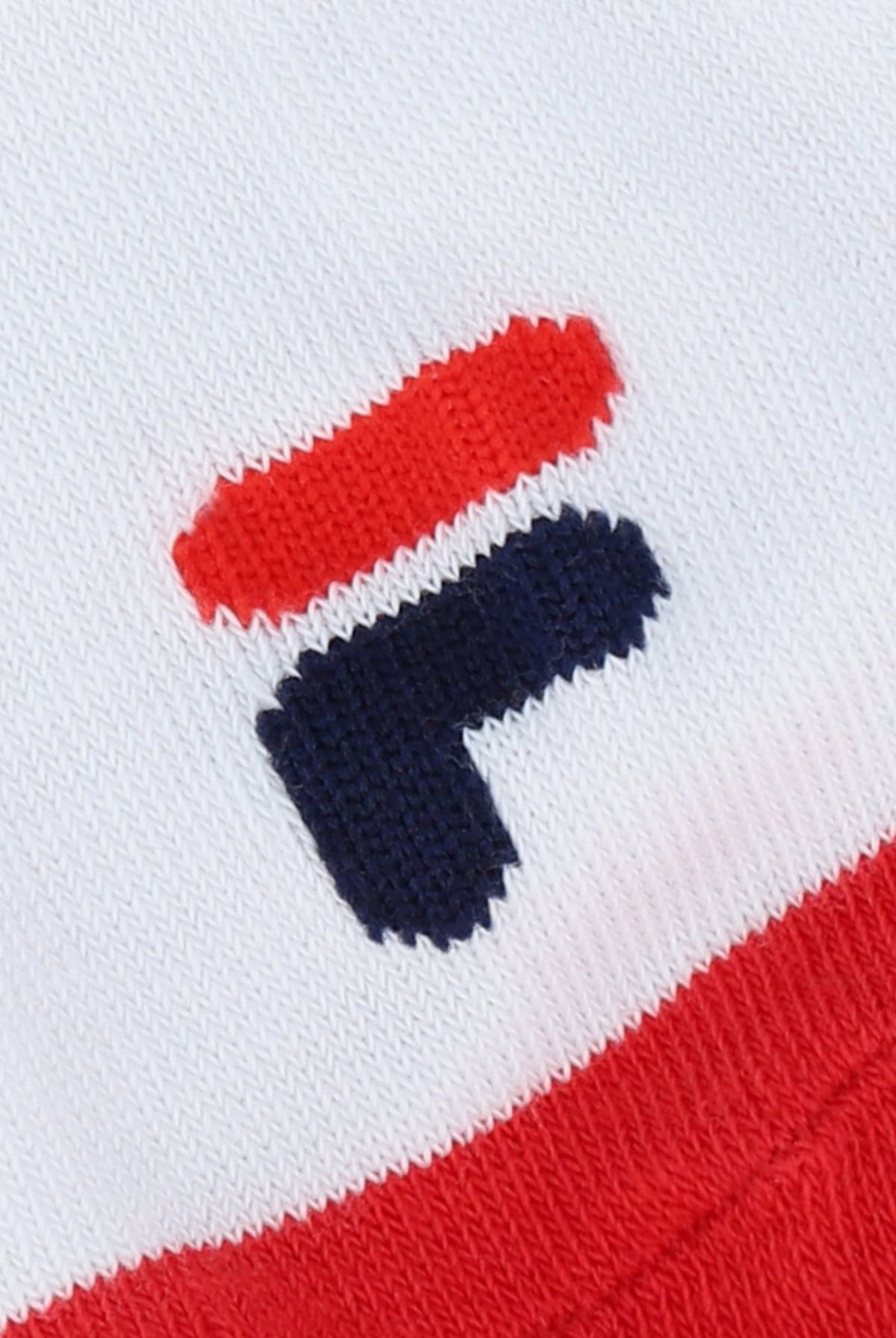 Blue and red FILA branding on the front of the sock.