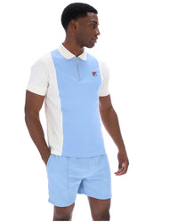 Displays a model wearing the Frozen 'Fila' branded Fjord Pierro Zip Up Polo