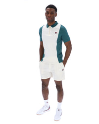 Displays a model wearing the Mediterranea 'FILA' branded Pierro Zip Up Polo