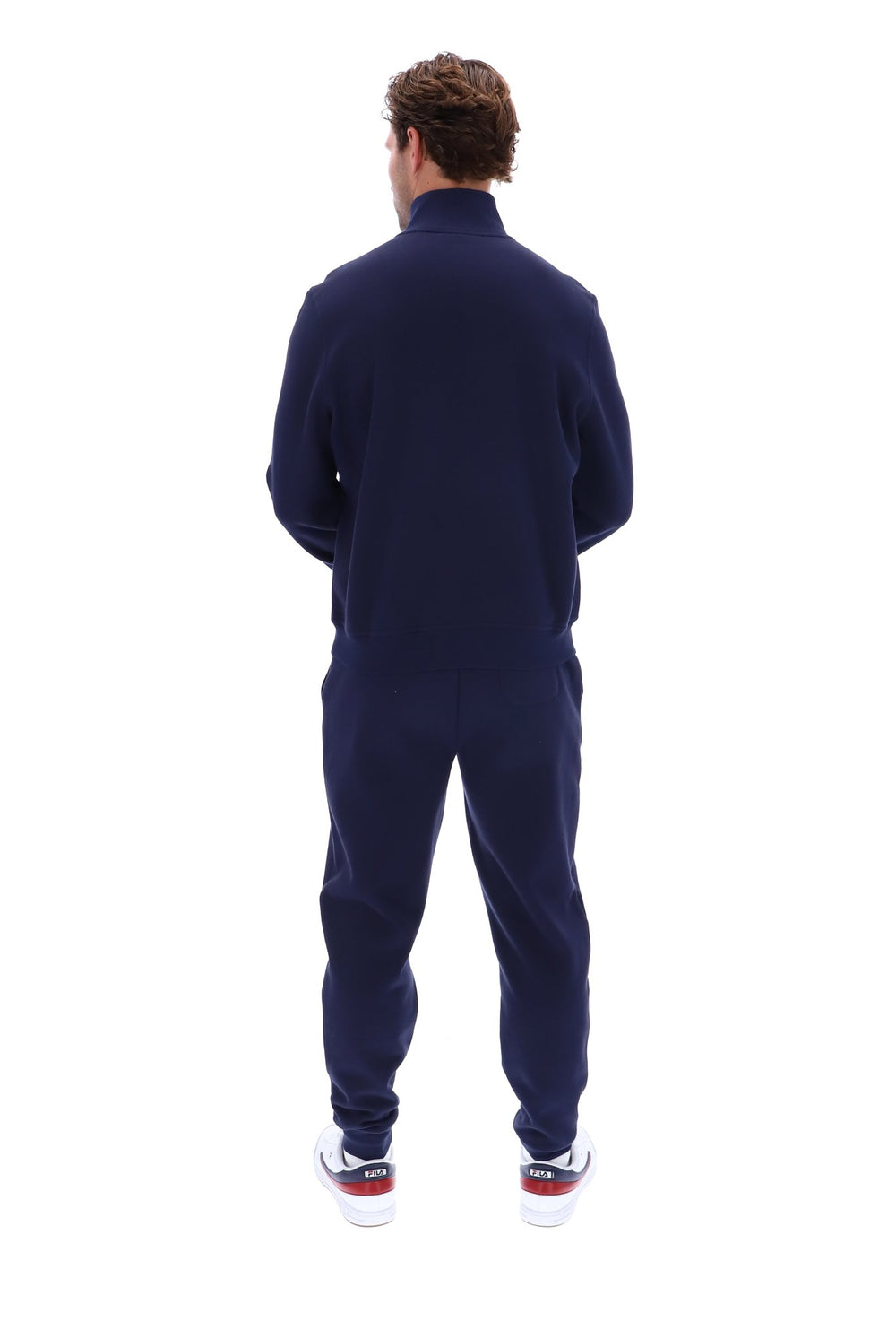 Displays a model wearing the 'FILA' branded Navy Ramy F-Box 1/4 Zip Up Jumper