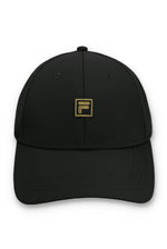 Black cap with a gold FILA logo on a white background