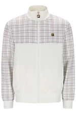 A white zip-up jacket with a high collar, featuring a white and red plaid pattern on the upper chest and sleeves, and a small gold-tone logo patch on the left chest.