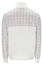 A long-sleeve crewneck sweater displayed on a mannequin, featuring a solid white lower body and a white upper yoke with a thin red and dark gray windowpane plaid pattern across the shoulders and upper sleeves.