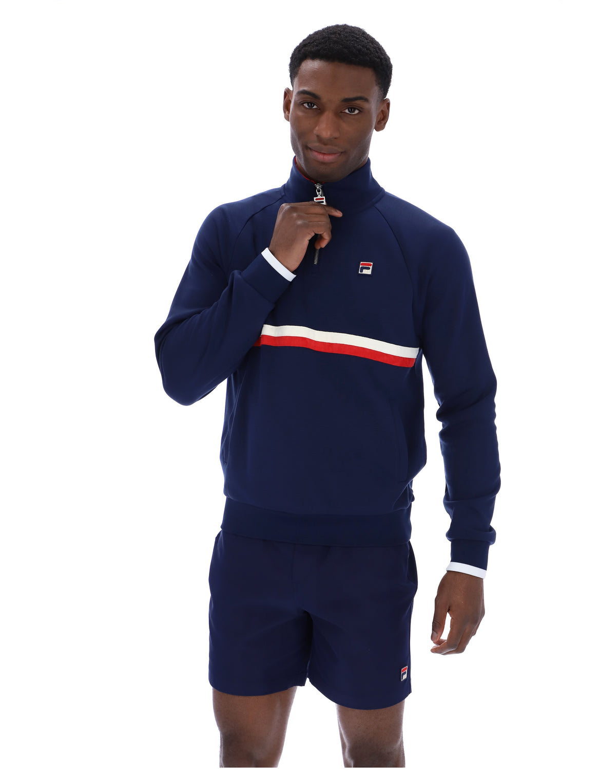 Displays a model wearing the Navy 'Fila' branded Rolando 1/4 Zip Neck Sweatshirt