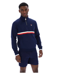 Displays a model wearing the Navy 'Fila' branded Rolando 1/4 Zip Neck Sweatshirt