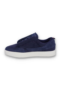 A pair of navy blue suede Festa trainers by FILA, featuring a low-top design and branded with the FILA logo.