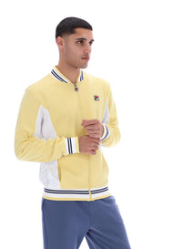 Man wearing a yellow and white jacket with a logo on a white background