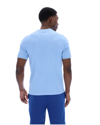 Displays a model wearing the Frozen 'Juicy' branded Fjord Silvio Simple Tee