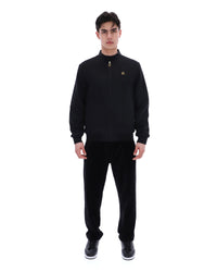 Display a model wearing the Black 'Fila' branded Smith Archive-Inspired Jacket