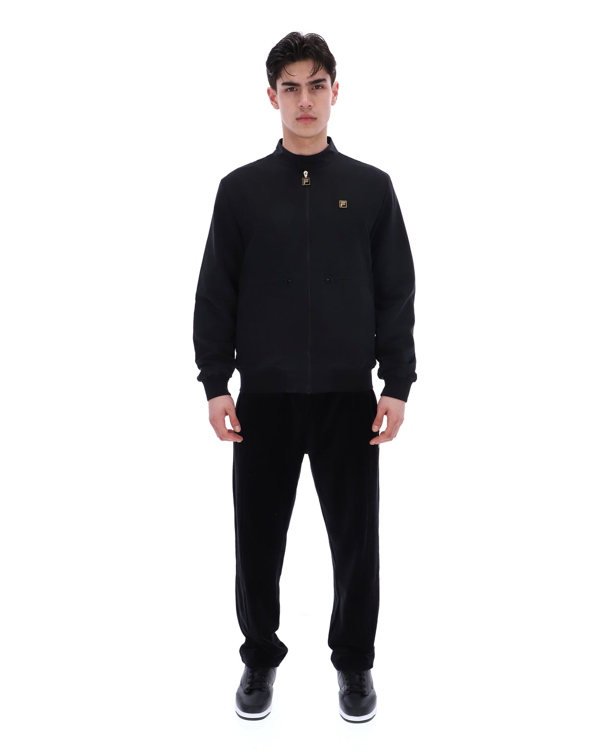 Display a model wearing the Black 'Fila' branded Smith Archive-Inspired Jacket