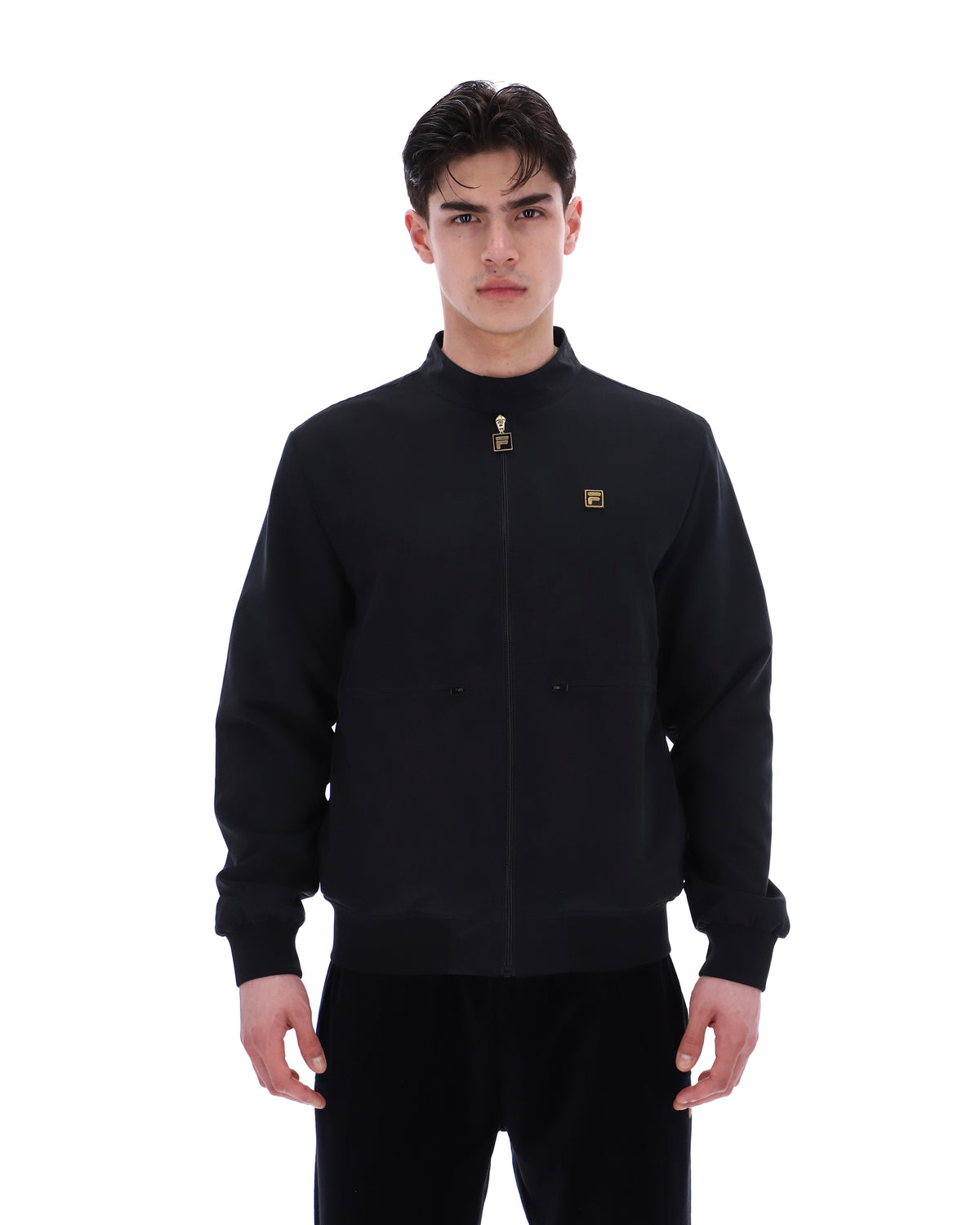 Display a model wearing the Black 'Fila' branded Smith Archive-Inspired Jacket