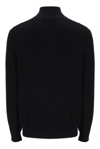 Displays the Black 'FILA' branded Stevie 1/4 Zip Funnel Neck Textured Knit