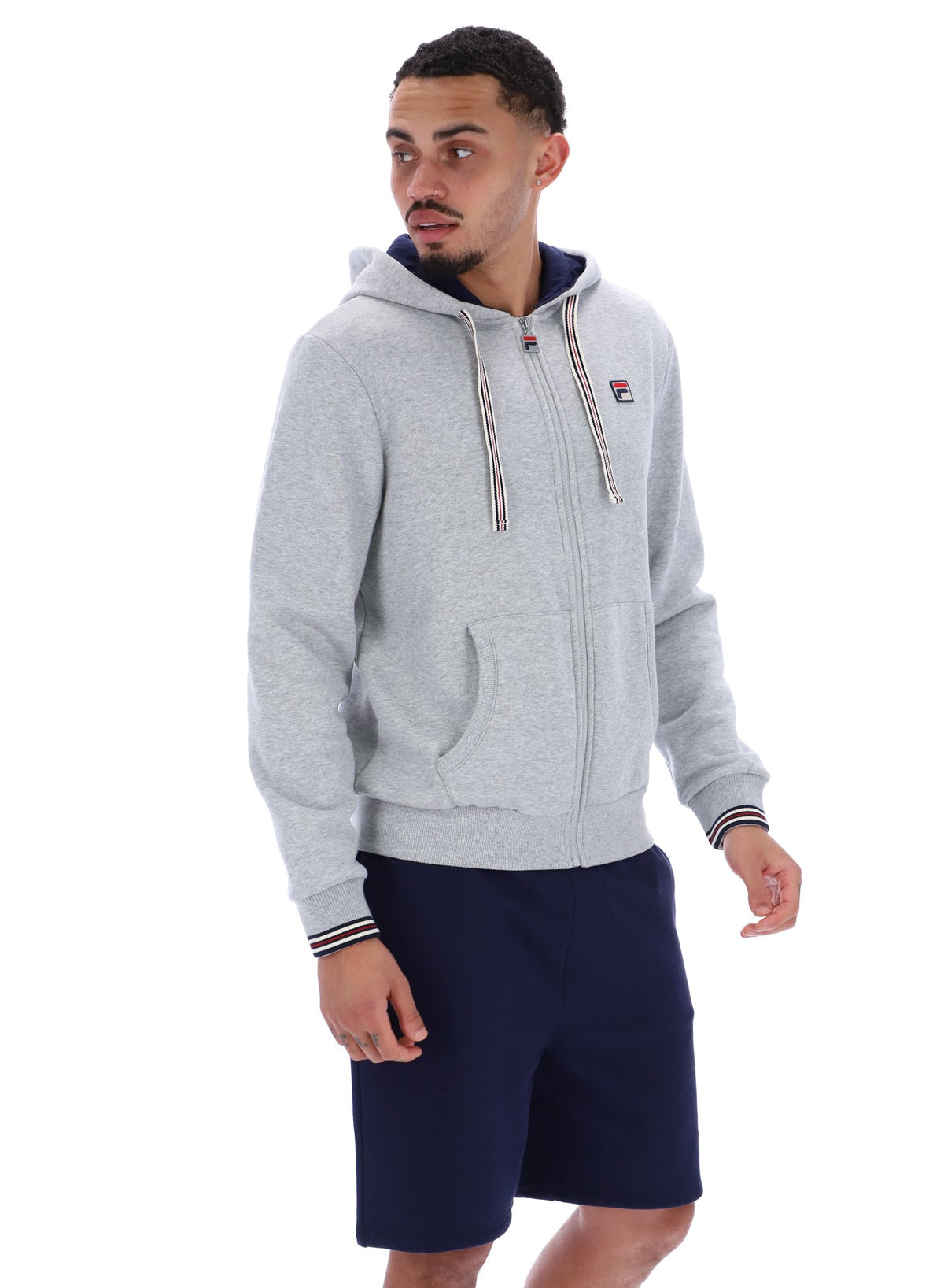 Man wearing a Grey Marl zip-through hoodie with a classic FILA logo on the chest on a white background