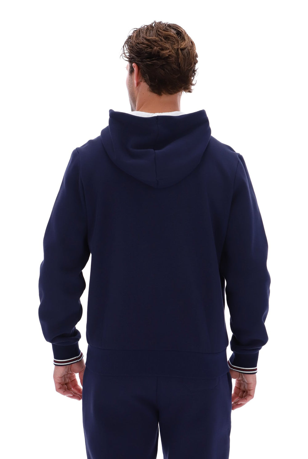 Displays a model wearing the 'Fila' branded Navy/ Gardenia Tenconi 2 Zip Thru Hoodie