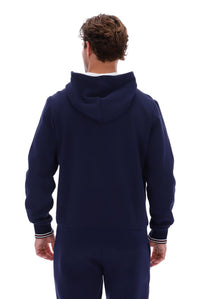Displays a model wearing the 'Fila' branded Navy/ Gardenia Tenconi 2 Zip Thru Hoodie