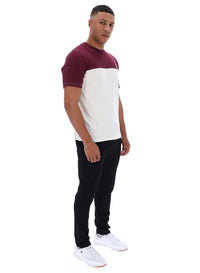 Displays a model wearing Fig Tiebreaker 'FILA' branded Colour Block T-Shirt