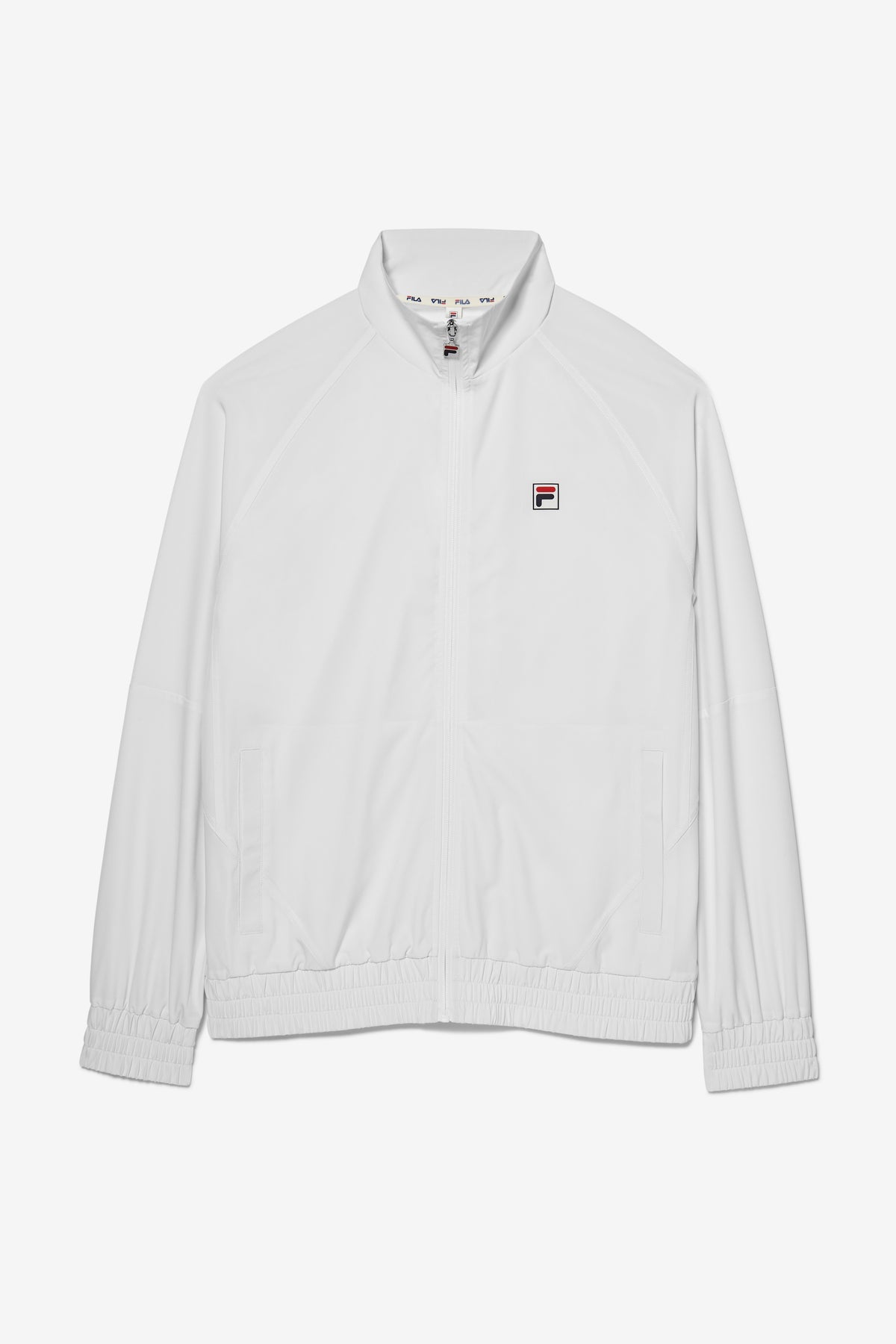 A white FILA tennis court track jacket with a zipper, collar and a small FILA logo on the chest.