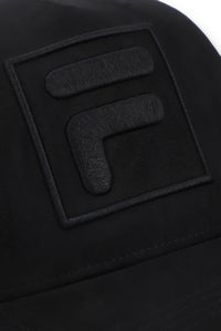 Displays a Black 'FILA' branded Turo Large F-Box Tonal Embroidered Suede Mesh-Back Cap featuring the FILA logo
