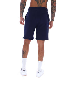 Displays a model wearing the Navy 'FILA' branded Vico Fleece Short