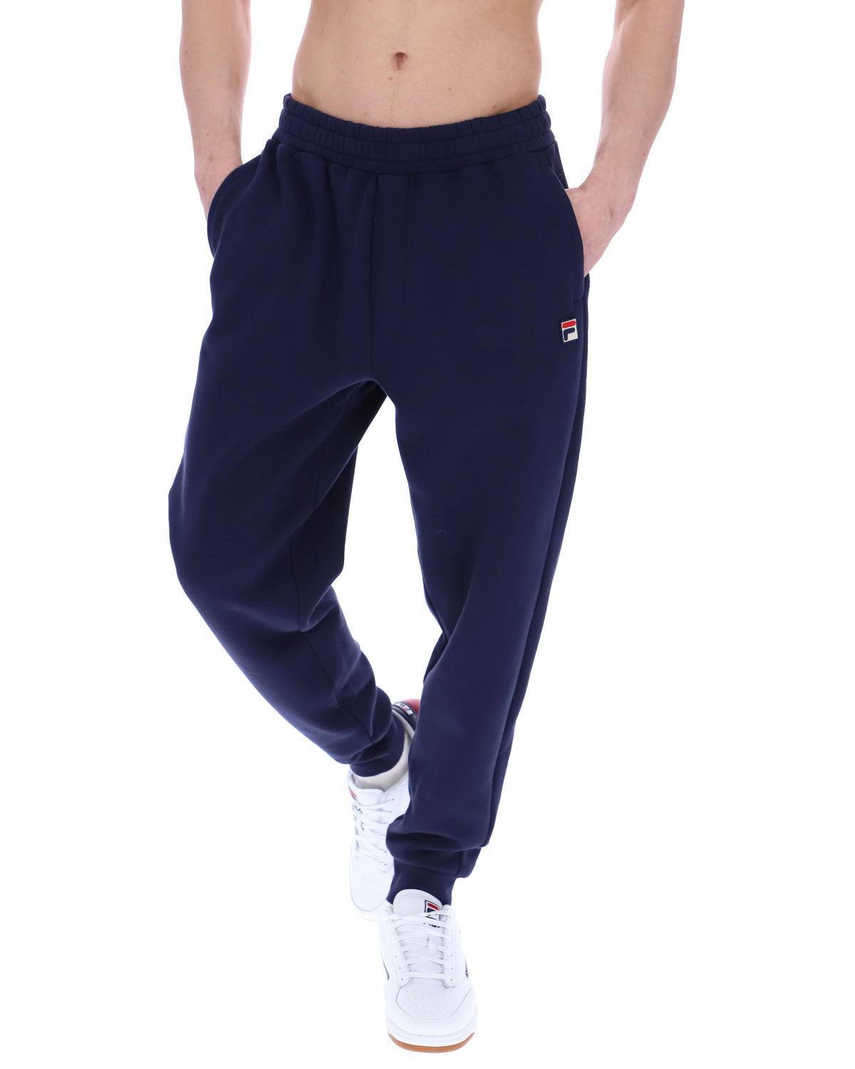 Displays the model wearing the Navy 'Fila' branded Visconti Tipped Cuff Track Pant