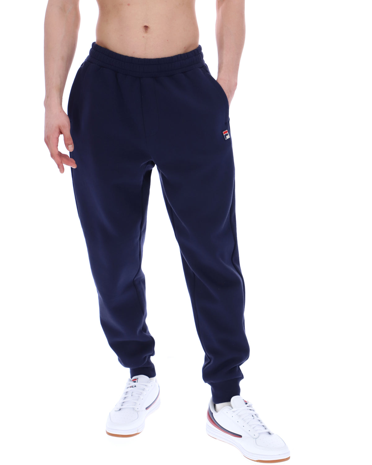 Displays the model wearing the Navy 'Fila' branded Visconti Tipped Cuff Track Pant
