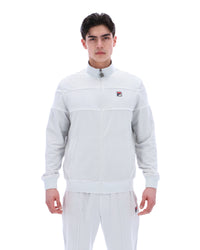 Displays a model wearing the Dawn Blue 'FILA' branded Vittorio Velour Track Top