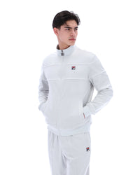 Displays a model wearing the Dawn Blue 'FILA' branded Vittorio Velour Track Top