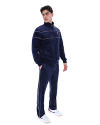 Displays a model wearing the Navy 'Fila' branded Vittorio Velour Track Top