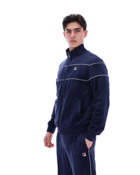 Displays a model wearing the Navy 'Fila' branded Vittorio Velour Track Top