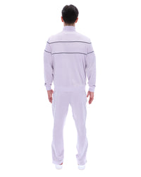 Displays a model wearing the Misty Lilac 'FILA' branded Vittorio Velour Track Top
