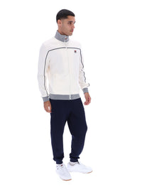 Displays a model wearing the Gardenia 'FILA' branded Zayn Track Top