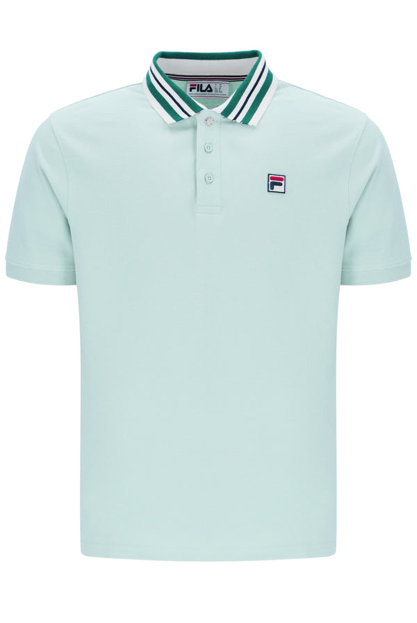 Light blue polo shirt with green and white collar, with a small FILA logo on the chest, against a white background
