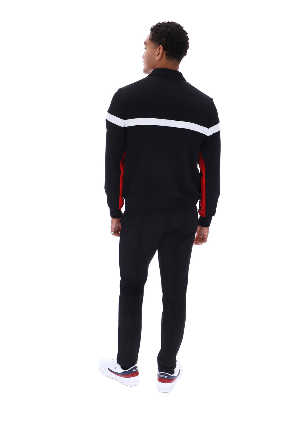 Displays a model wearing Black 'Fila' branded Red/WhiteAlex Cut And Sew Jacket