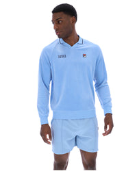 Displays a model wearing the Frozen 'FILA' branded Fjord Alfredo 1911 Velour Raglan Long-Sleeve Top