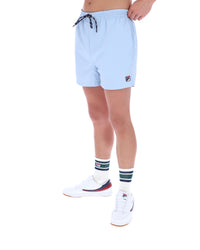 Light blue shorts worn by a person on a white background