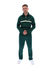 Displays a model wearing the Rain Forest 'FILA' branded Camilo Knitted Half Zip Jumper