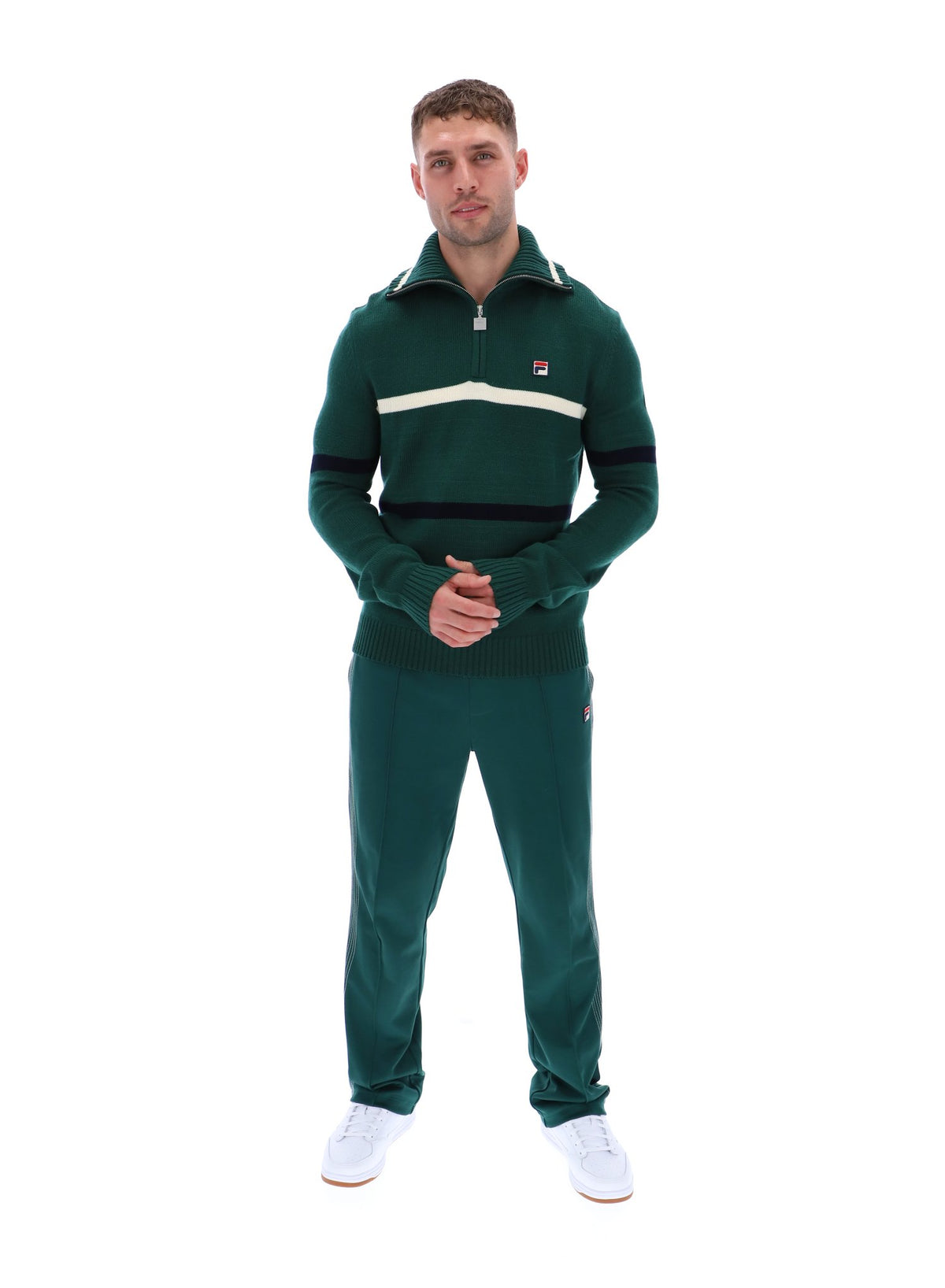 Displays a model wearing the Rain Forest 'FILA' branded Camilo Knitted Half Zip Jumper