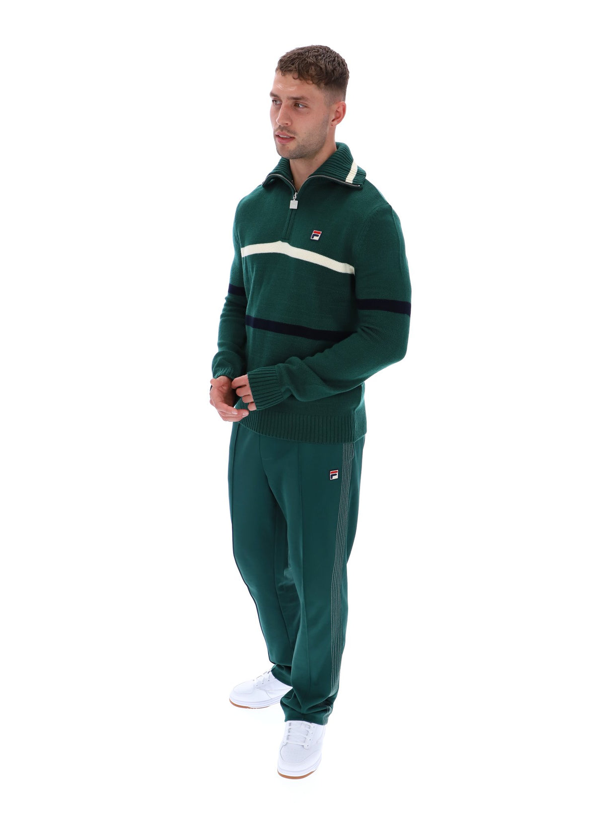 Displays a model wearing the Rain Forest 'FILA' branded Camilo Knitted Half Zip Jumper