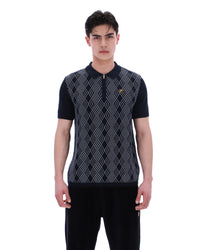 Man wearing a patterned polo shirt on a white background