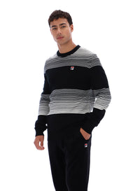 Displays a model wearing the Black 'FILA' branded Connor Striped Knit Crew Neck