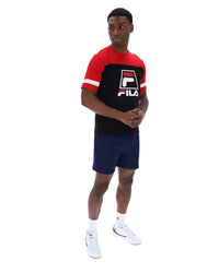 Displays a model wearing the Black 'Fila' branded Damon Cut and Sew Tee